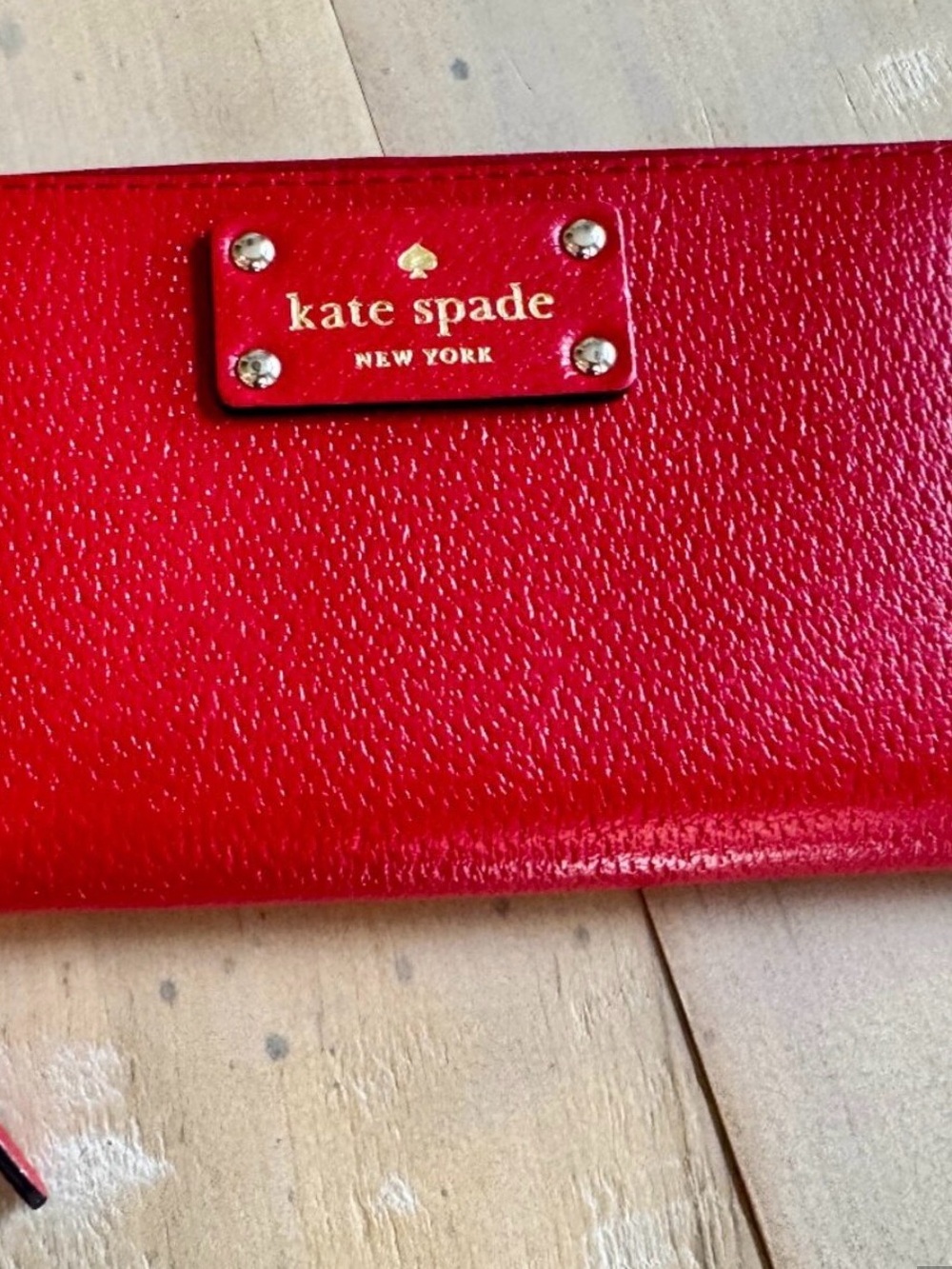 KATE SPADE STACI LARGE CONTINENTAL WALLET IN FLUORESCENT GERANIUM